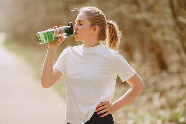 For a flat stomach, you should follow a drinking regime, consuming enough water